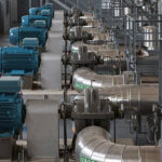 Inside a pumping station- in the foreground large-pump group